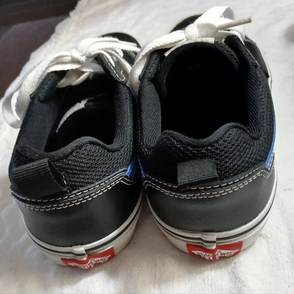 Vans Black Sneakers with Blue Accents and White Laces